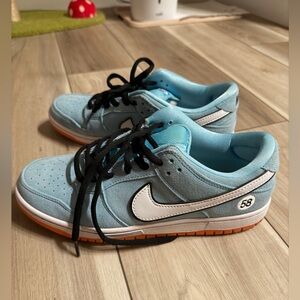 Nike Blue and White Low-Top Sneakers with Orange Outsole